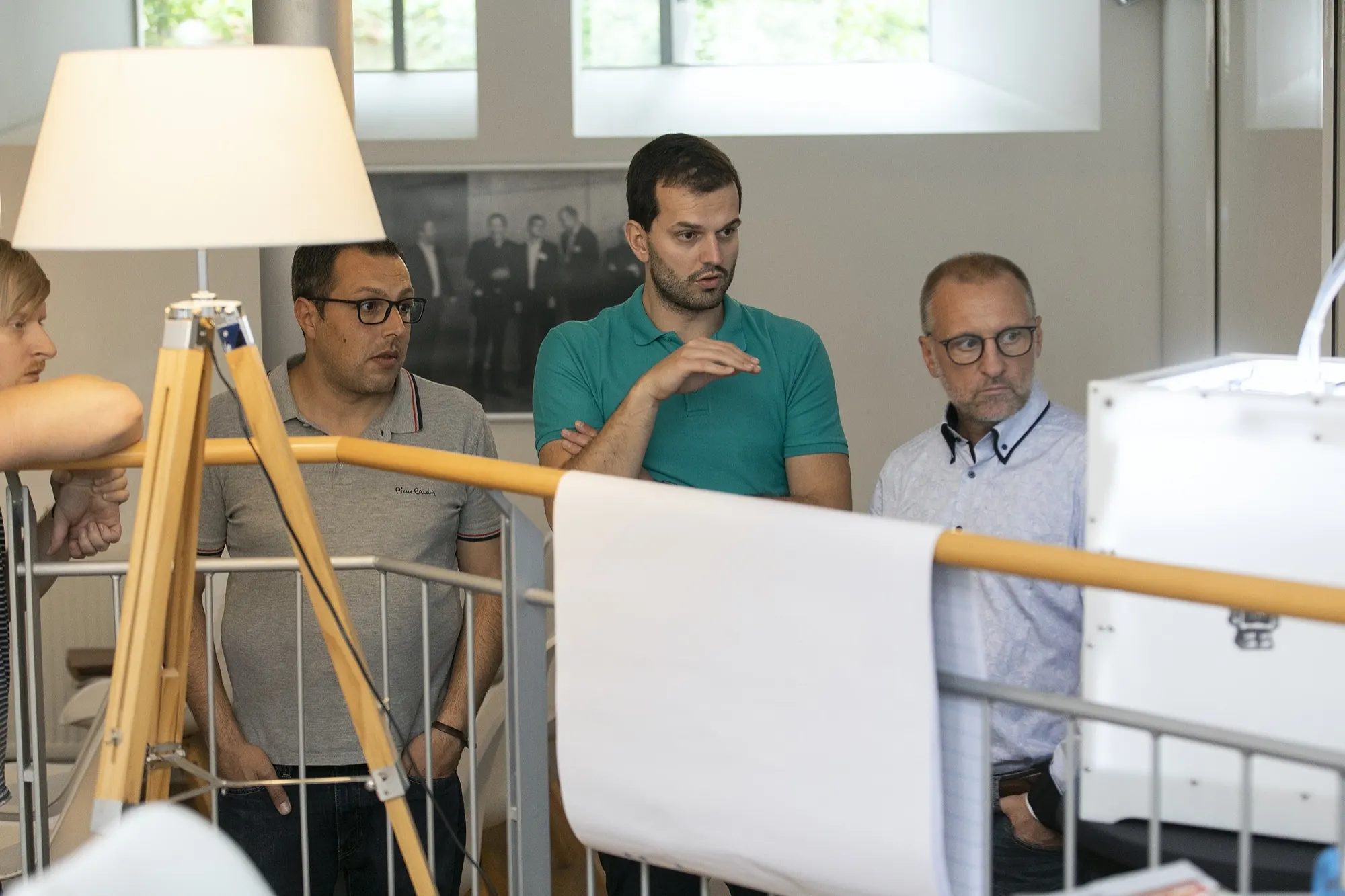 Participants discussing at a round table in a workshop