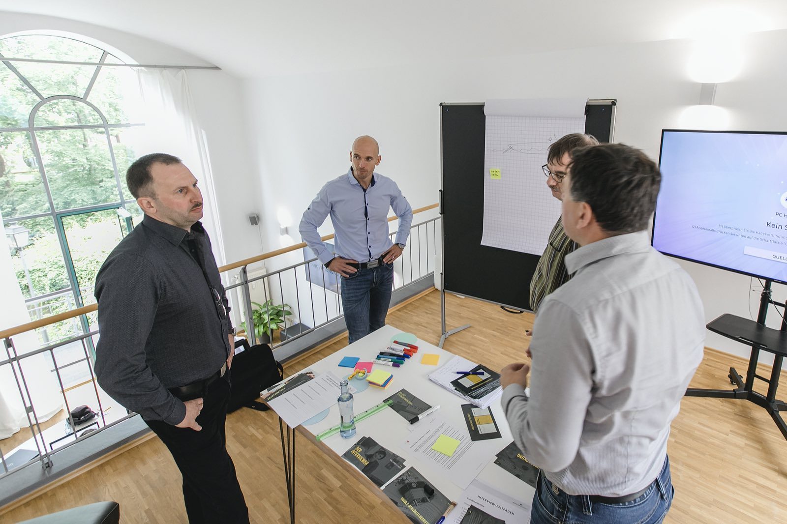 Arbeit am Flipchart während der Challenge in München